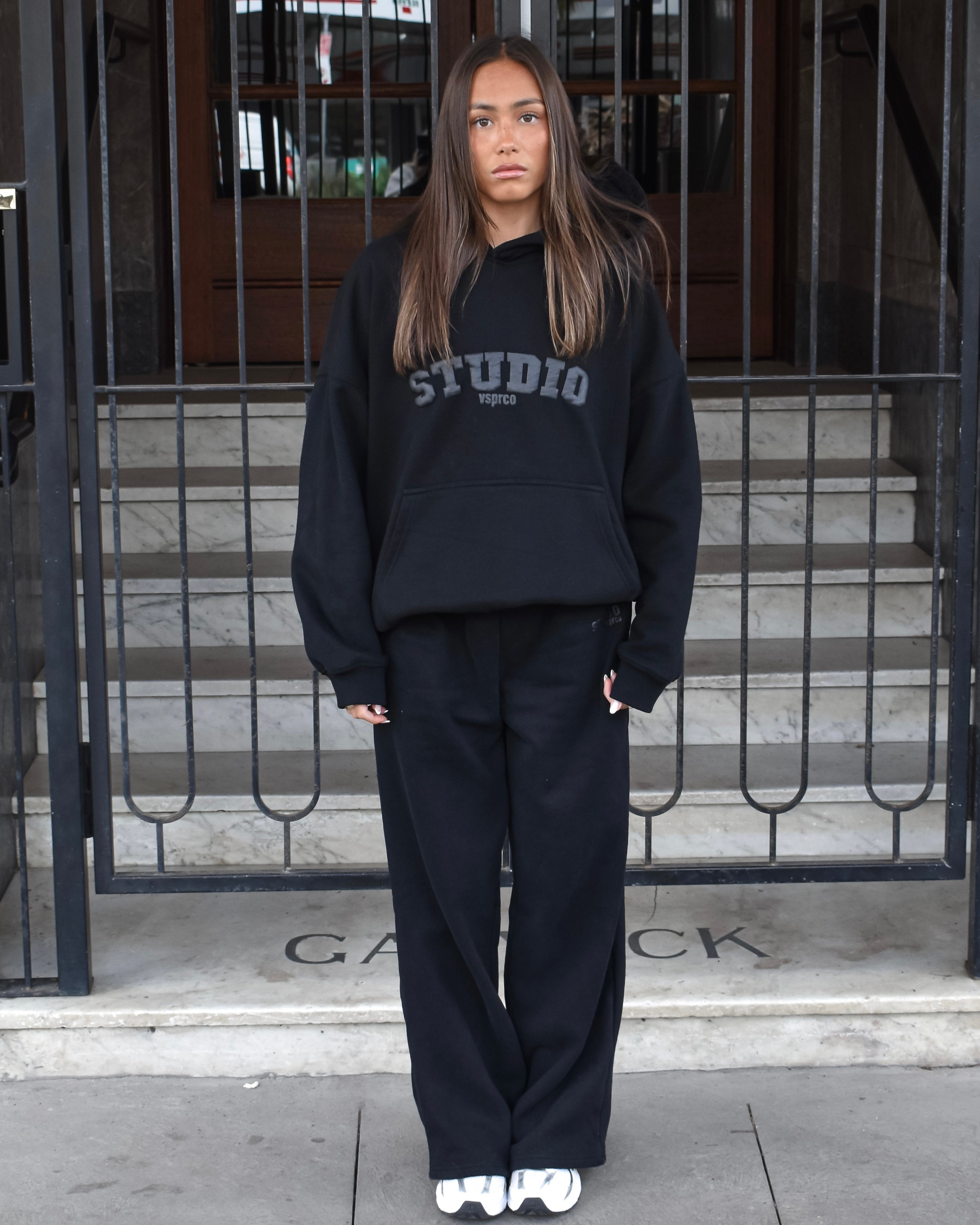 The Varsity Wide Leg Trackpants in Obsidian (Fleece)