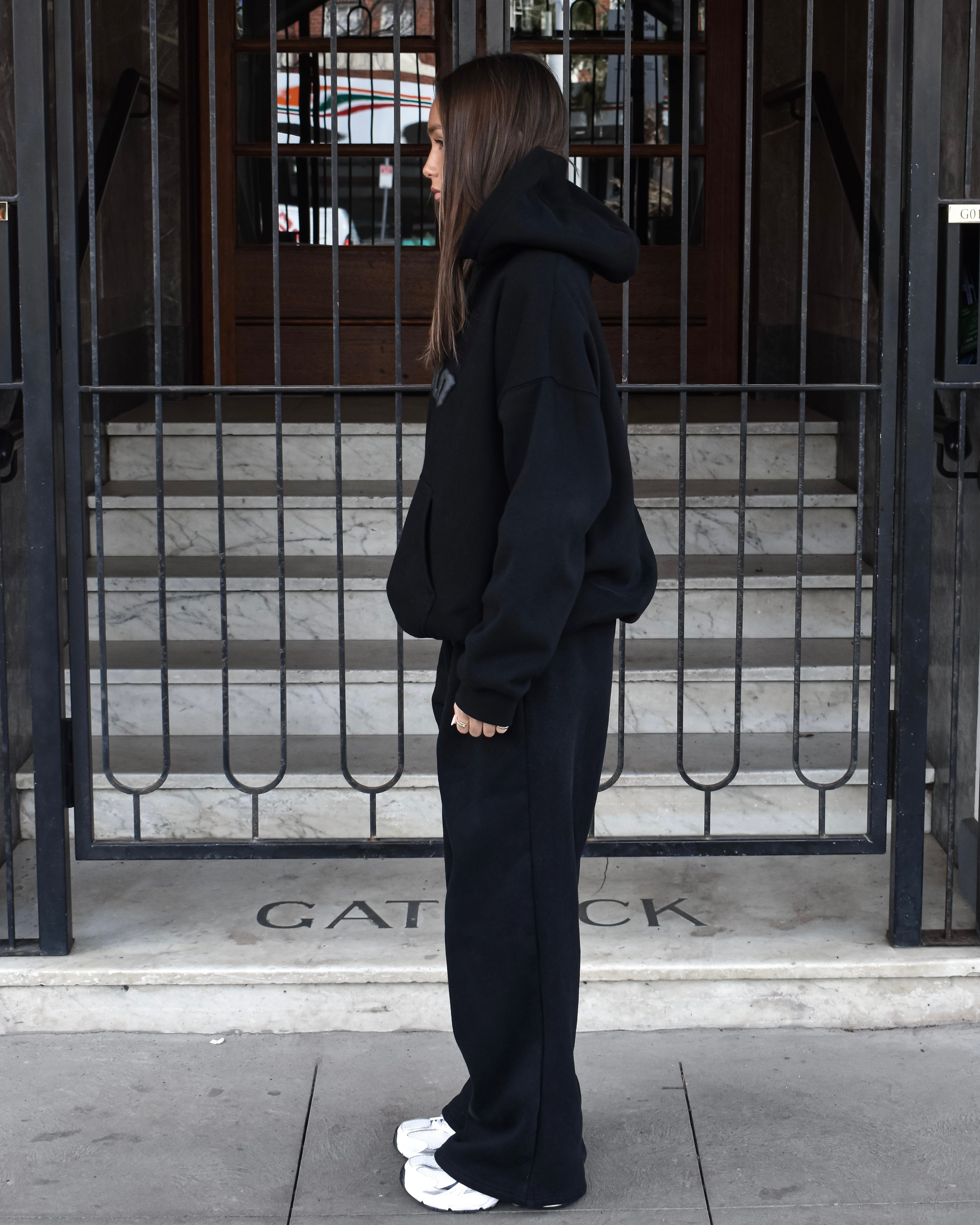 The Varsity Wide Leg Trackpants in Obsidian (Fleece)