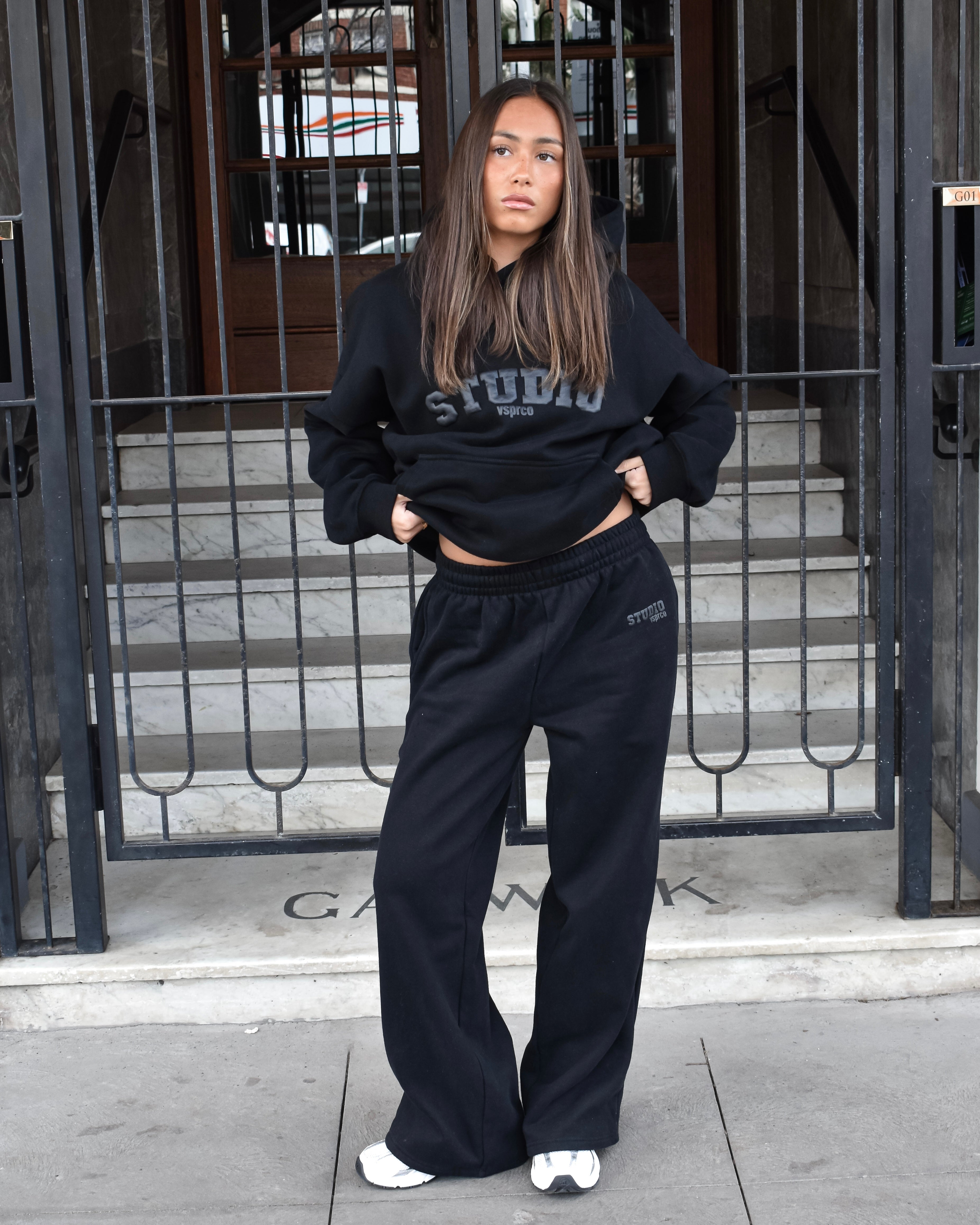 The Varsity Wide Leg Trackpants in Obsidian (Fleece)