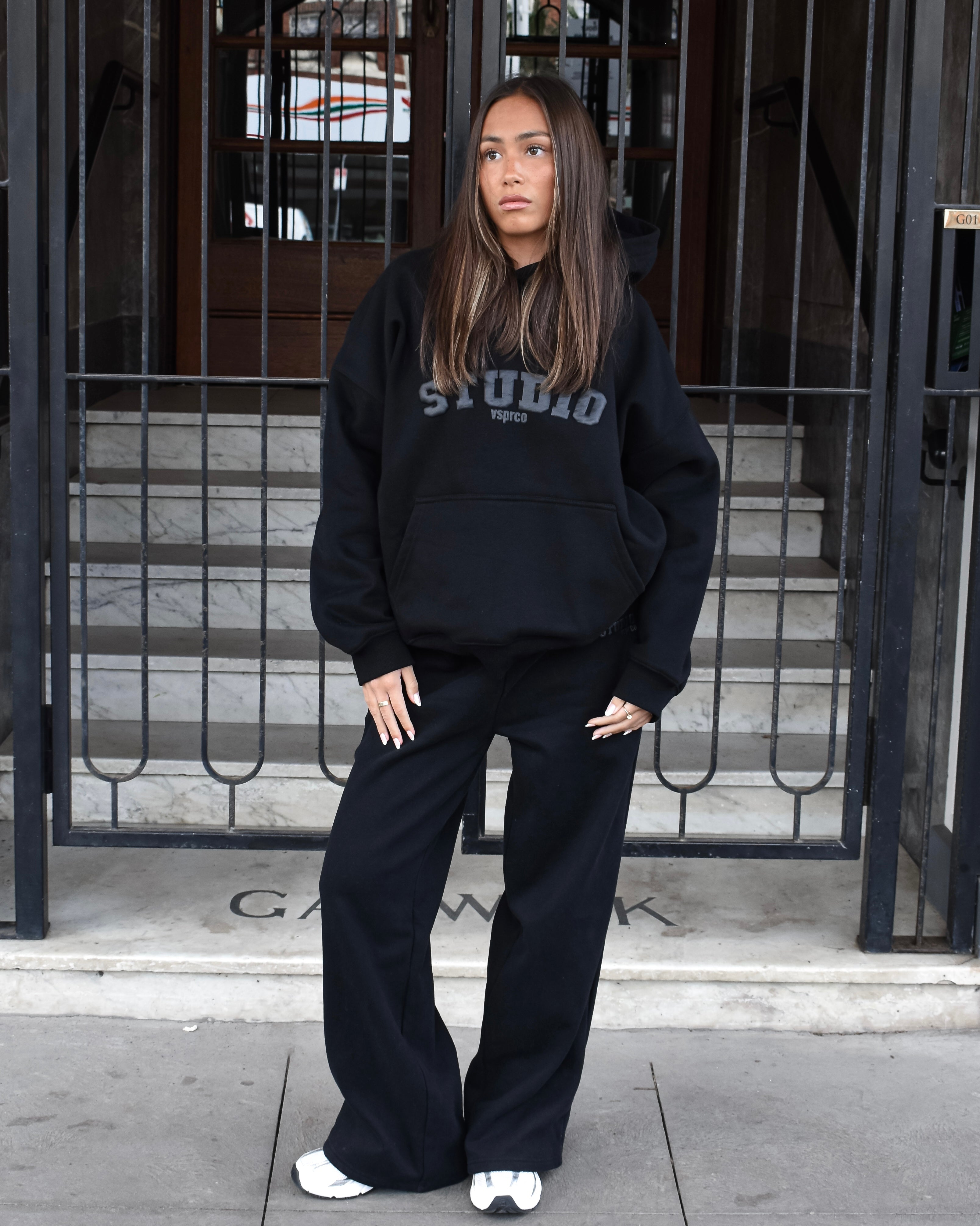 The Varsity Wide Leg Trackpants in Obsidian (Fleece)